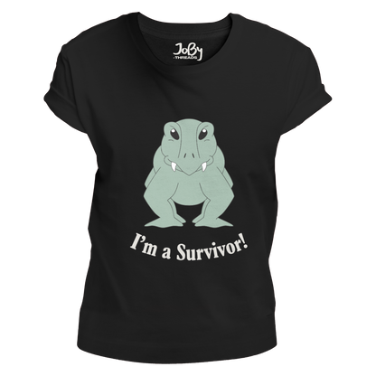 Front view of a black fitted ladies' T-shirt showcasing Lloyd the Lystrosaur, a resilient reptile with a knowing glint in his eyes and a tusky grin, accompanied by the bold statement "I’m A Survivor!" below. Designed by Eva Hancox and crafted from 100% cotton, it is ideal for fans of quirky animal stories and prehistoric charm.